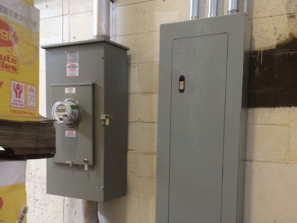 Electrical meter and panel install closeup